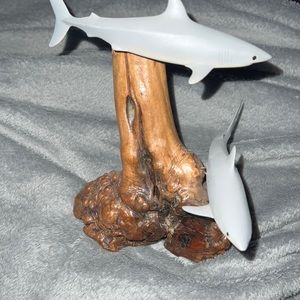 Shark sculpture with wood base